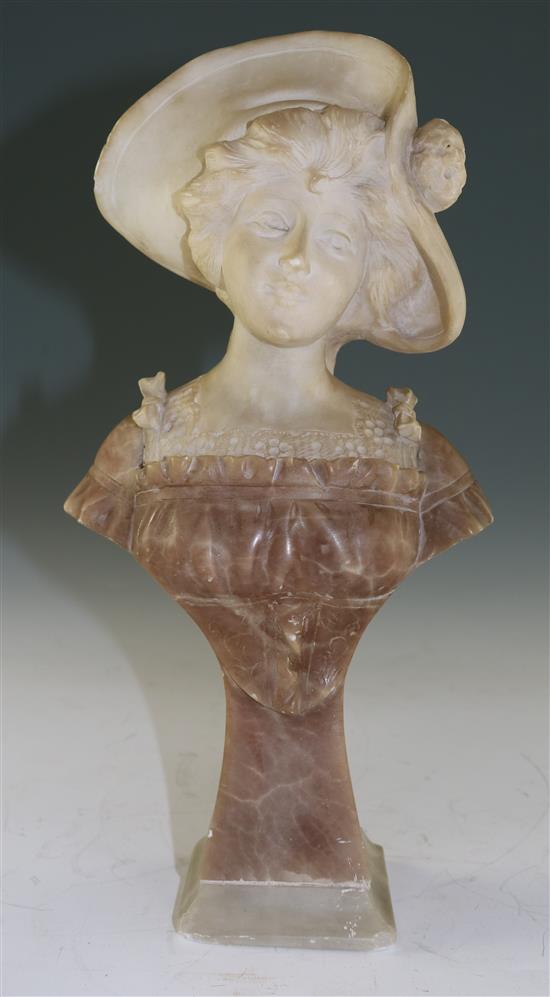 An Art Nouveau carved two colour alabaster bust of a young lady wearing a bonnet, 12in.